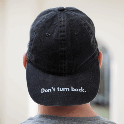 Don't turn back. - Organic cotton baseball cap.